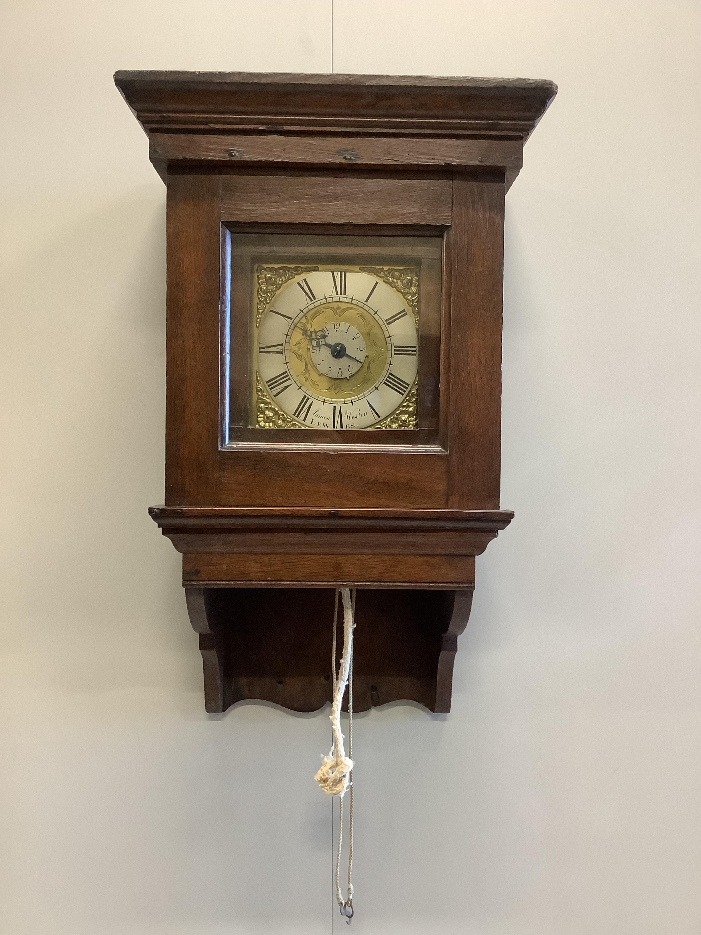 James Weston, Lewes. An oak wall clock, the 6.25in. dial with central subsidiary dial, height 53cm